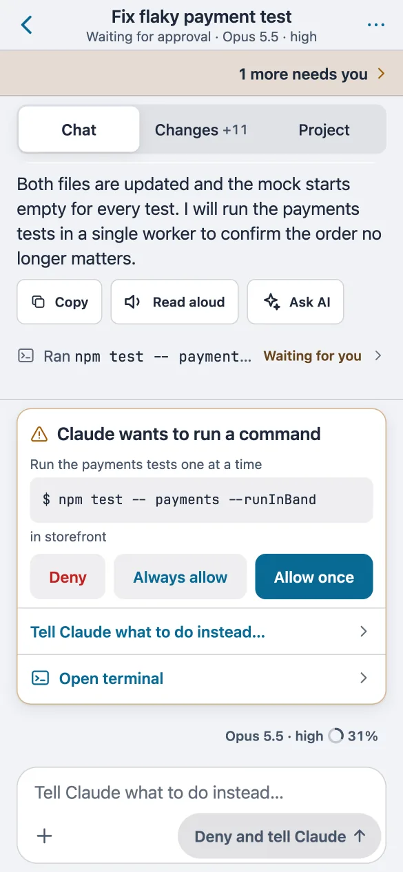 A session chat on the phone with a card asking to allow the command npm test.